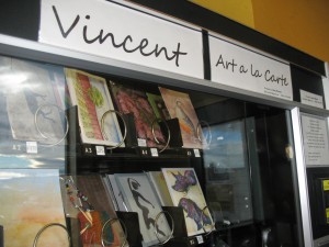 Art sits inside the metal rings of Vincent Art à la Carte, a snack machine that sells art from 15 Lewiston-Clarkston artists. Vincent is located inside Clarkston's Roosters WaterFront Restaurant. 